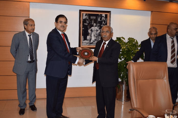 it MD NTC Mr. Viqar Rashid Khan presenting memento to Minister for IT & Telecom