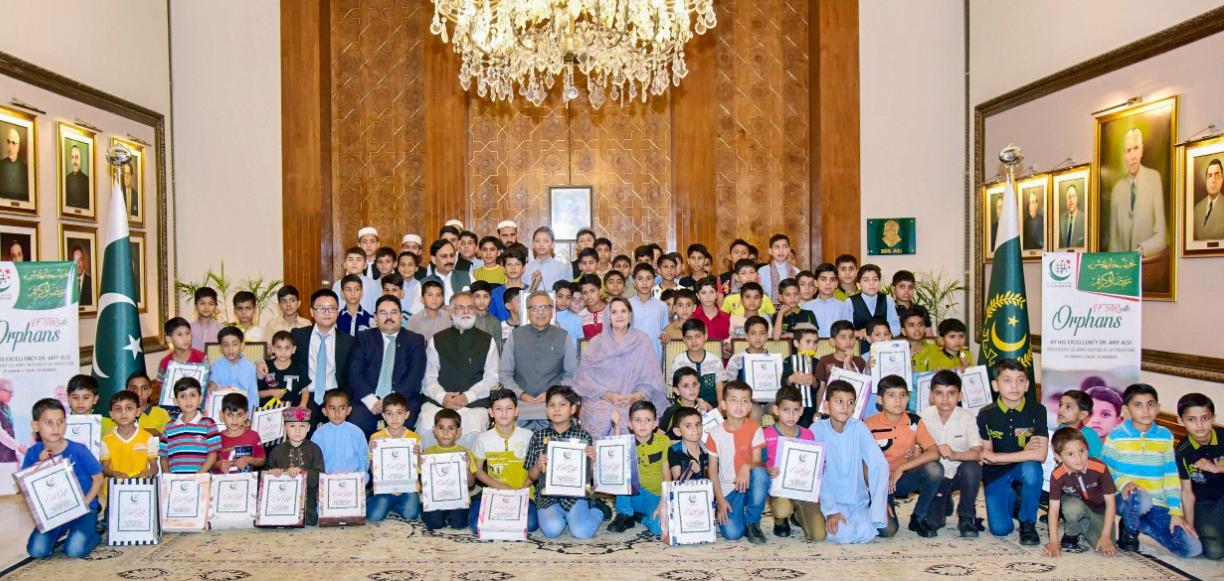 Arif Alvi, the President of Pakistan hosts an iftar for orphans, attended by Chairman Khubaib Foundation and the CEO of Tecno Mobile
