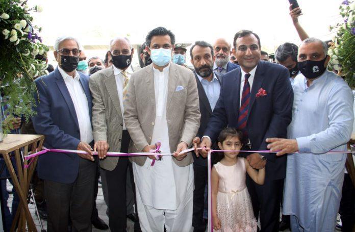 Federal Minister Hammad Azhar visits a section after inauguralting Arilink Smartphone Manufacturing ffacility