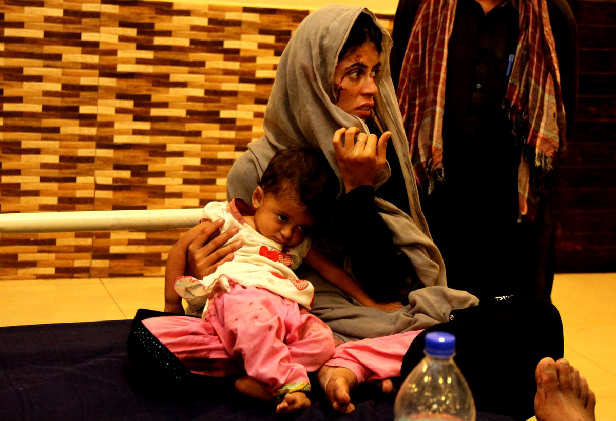 Woman Seen Sitting With Her Child At Civil Hospital