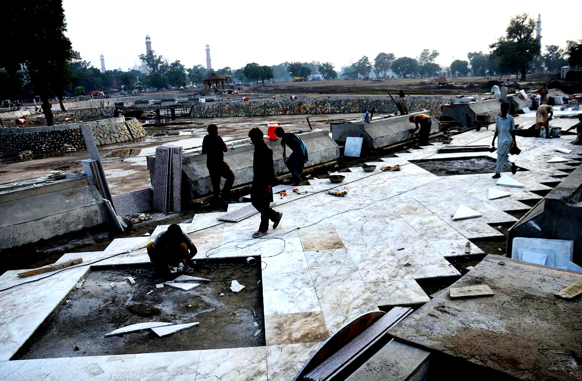 Labourers Seen Working During Construction At Minar-e-Pakistan