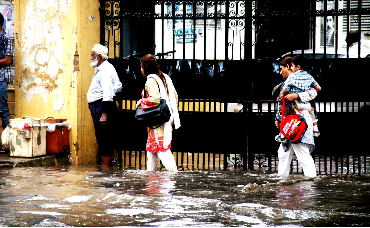 Women Face Hardships Due To Rainwater Accumulated At City Courts After Monsoon