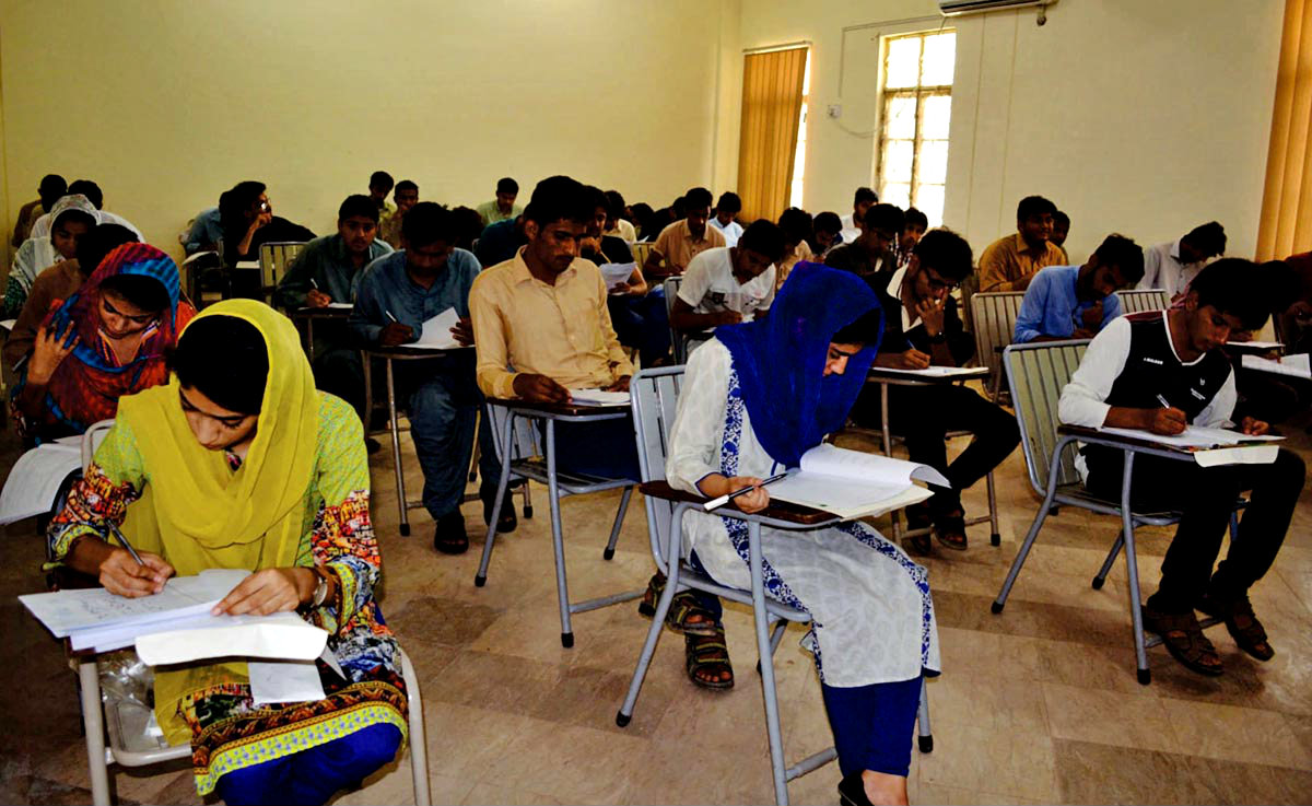 Candidates Solving Their Question Paper During Test For Admission
