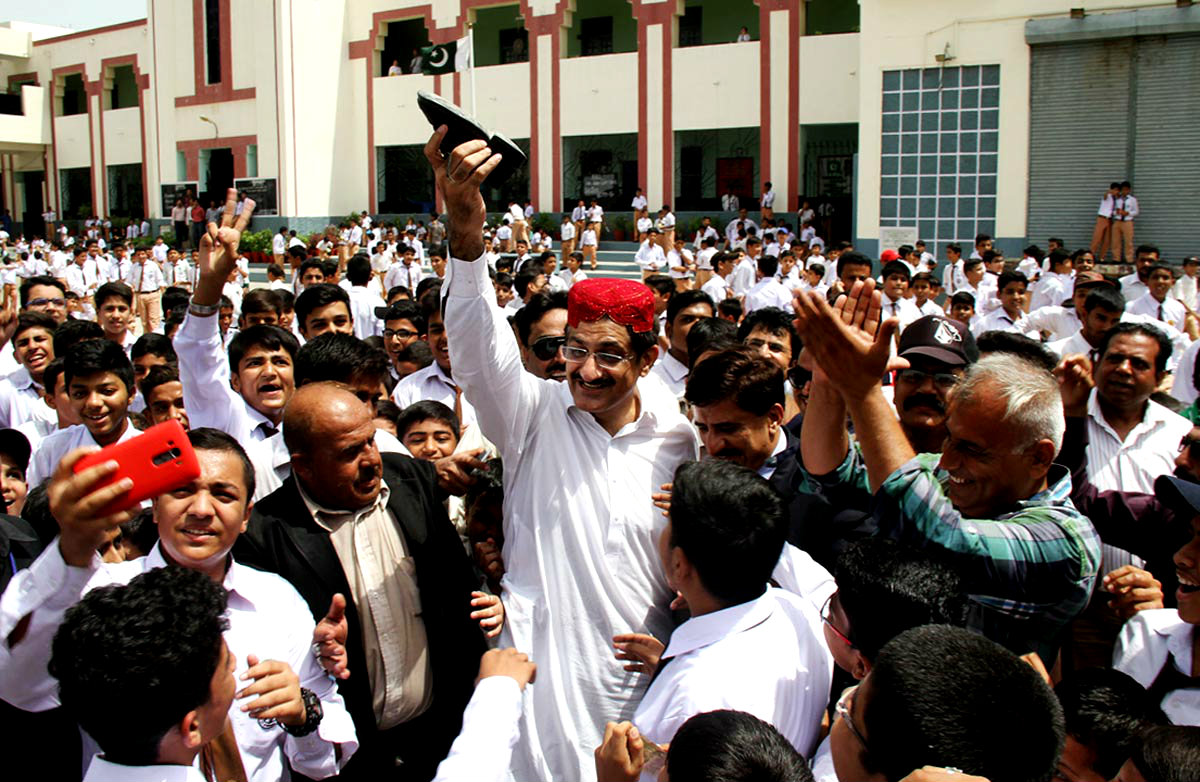 Sindh Chief Minister Syed Murad Ali Shah Seen Holding A Shoe Of A Student