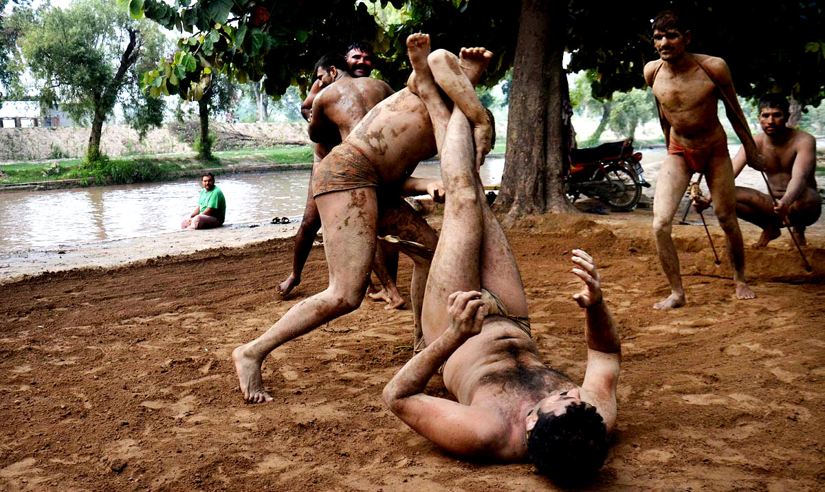 Pakistani Traditional Wrestlers Seen During A Practice Session