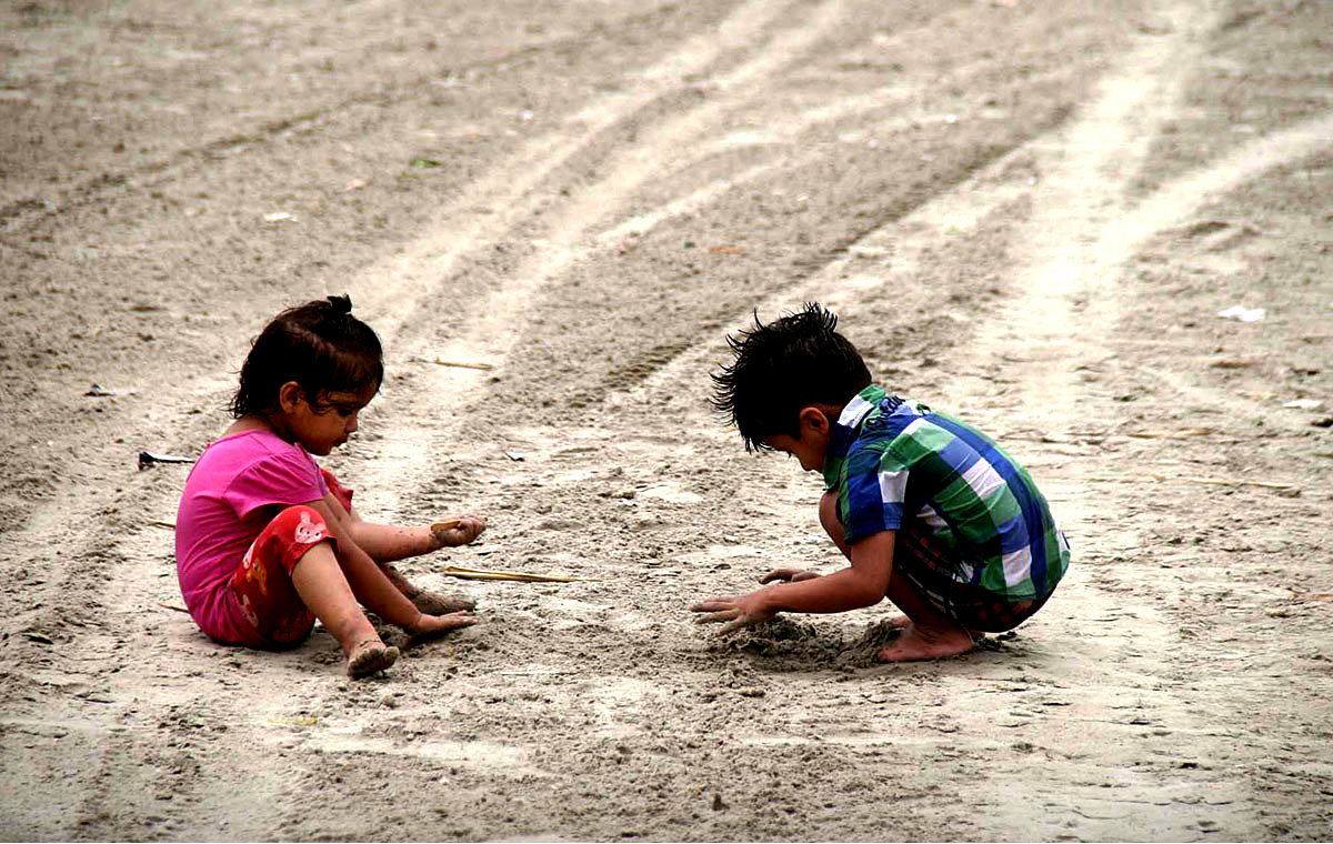 Kids Seen Playing With Sand