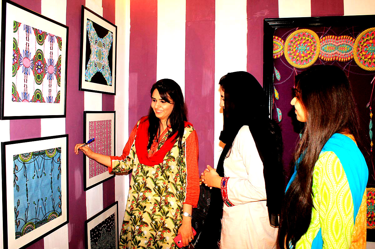 Sialkot:Visitors Looking At Displayed During An Exhibition