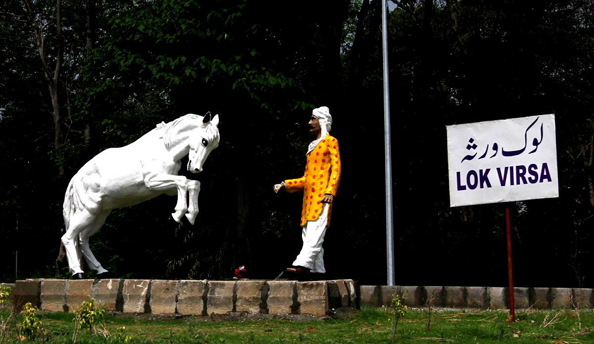 The Model Of The Drummer On Islamabad Highway.