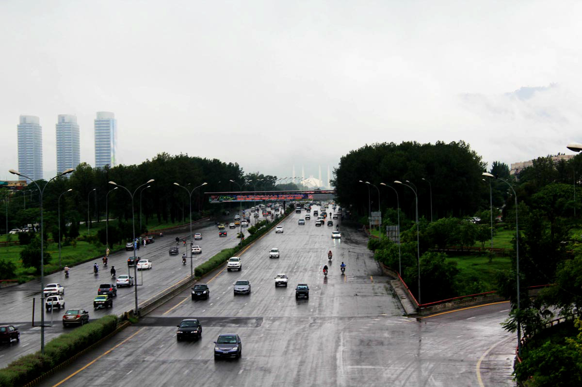 Motorists Moving on Islamabad Highway During Heavy Rain