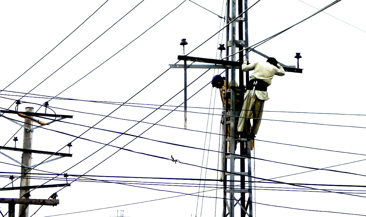 Wapda Workers Seen Busy In Repairing Power Cables